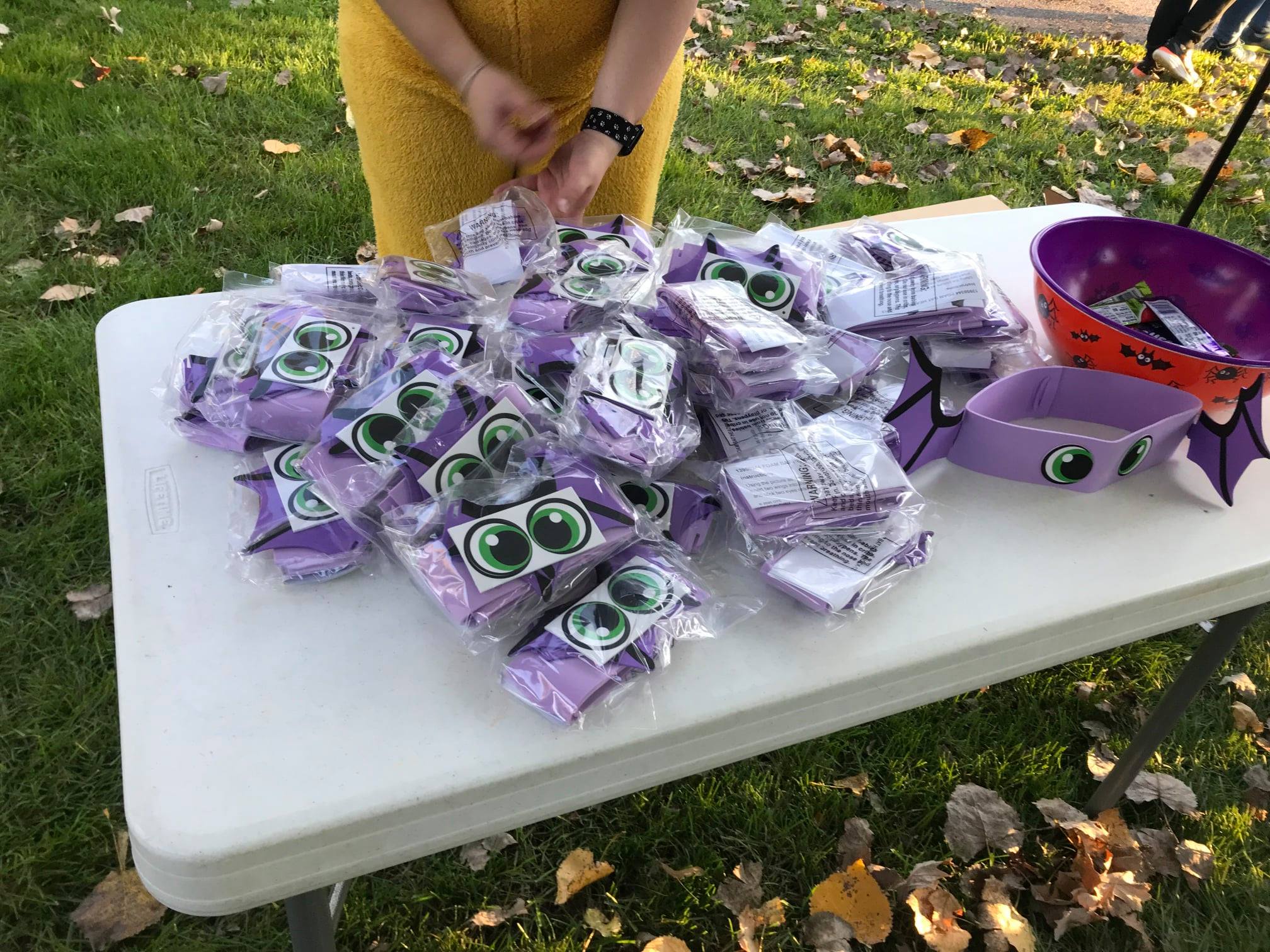 A table full of craft packages to make spooky headbands