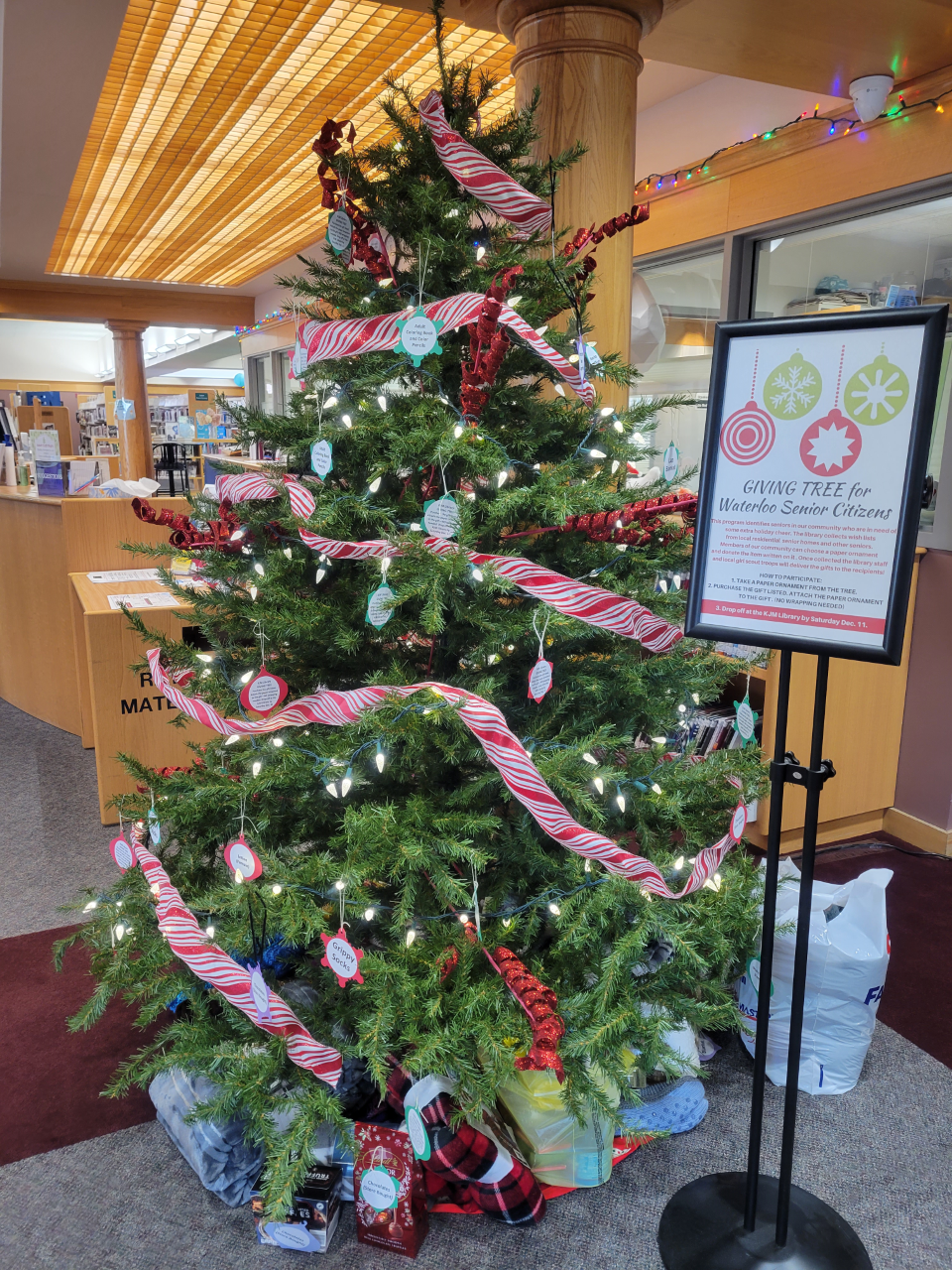 Decorated Christmas tree in lobby of library