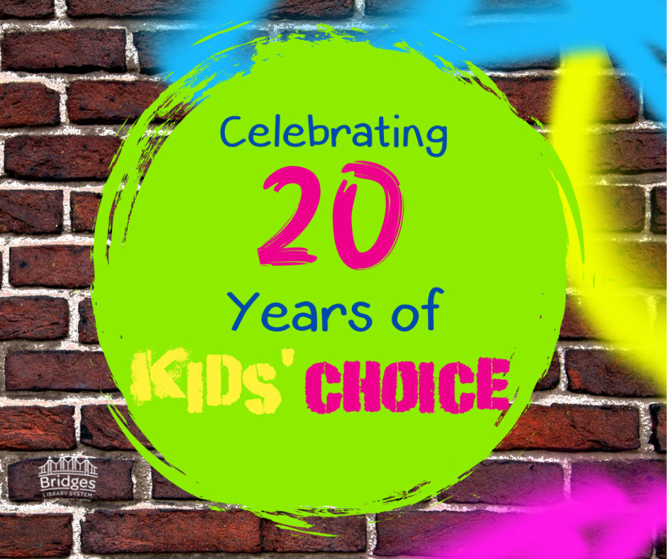 Paint splotch on graffiti brick wall with text that reads "Celebrating 20 years of Kids Choice"