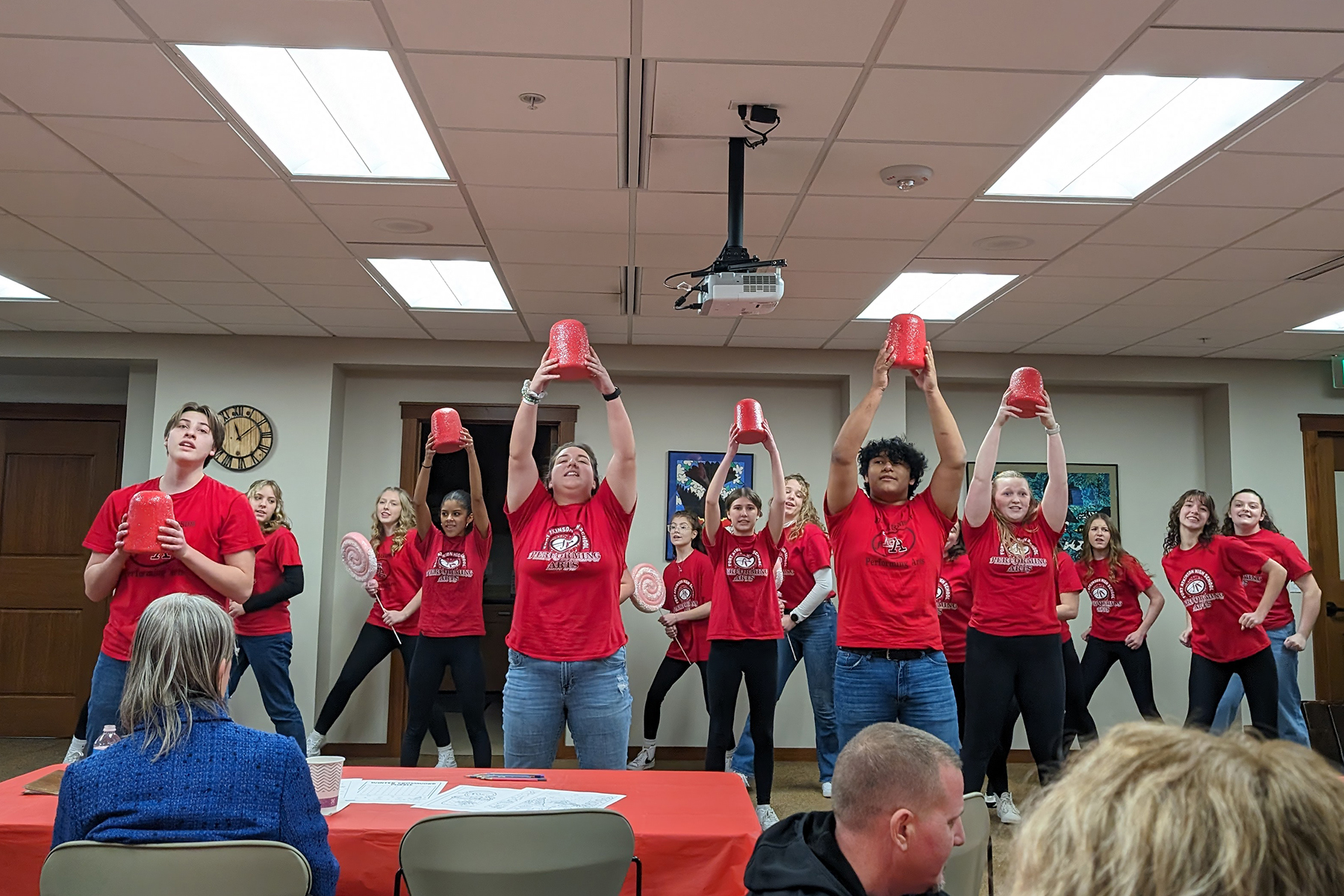 • Photo of Fort Atkinson High School Show Choir performing “Candy Land” for the attendees of the Memory Café on January 8 at Dwight Foster Public Library in Fort Atkinson.