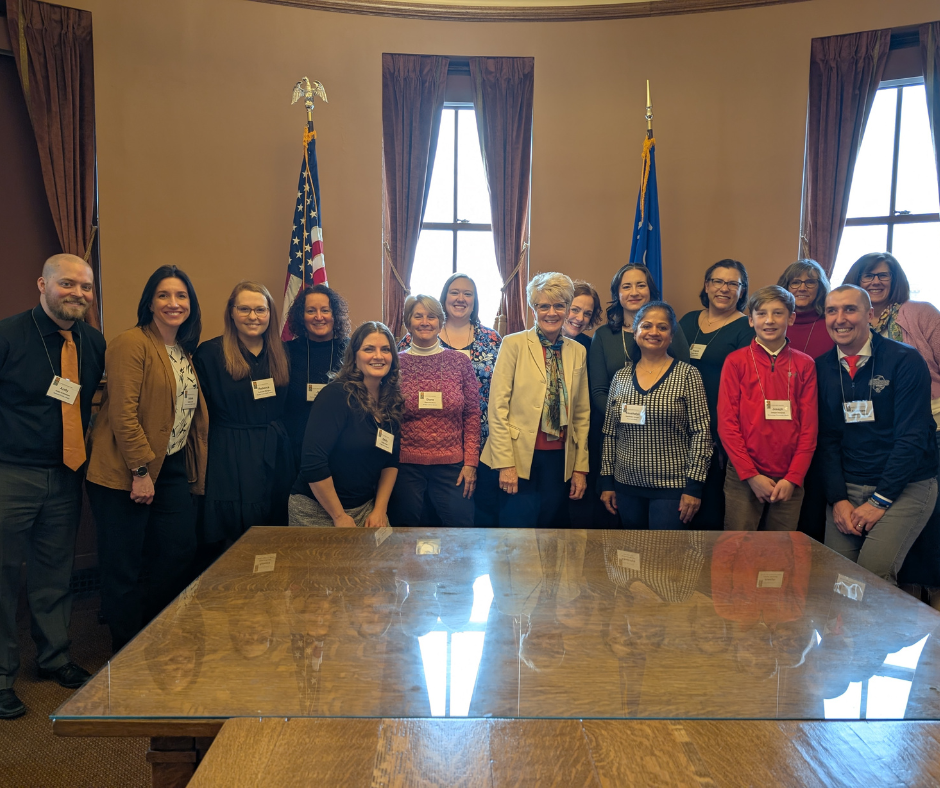 Photo of a group of library staff and supporters with Senator Chris Kapenga's staff at 2025 Library Legislative Day.