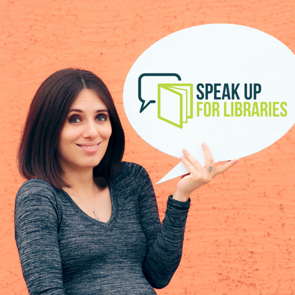 Person holding a sign in the shape of a speech bubble with the Speak Up For Libraries logo on it with a book icon overlapping a speech bubble icon.