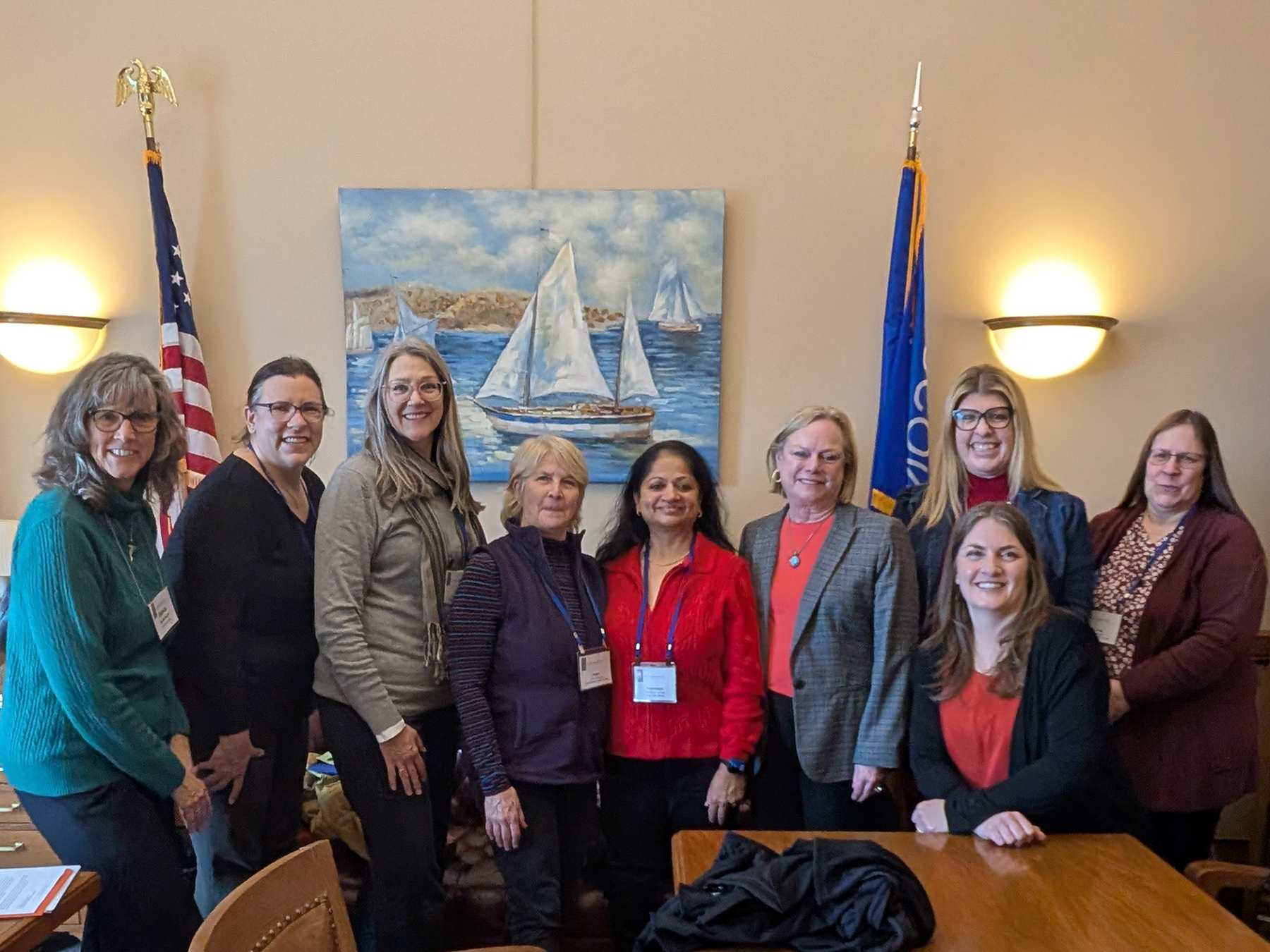 A group of library staff and trustees with Representative Cindi Duchow inside the Wisconsin State Capitol building in Madison.